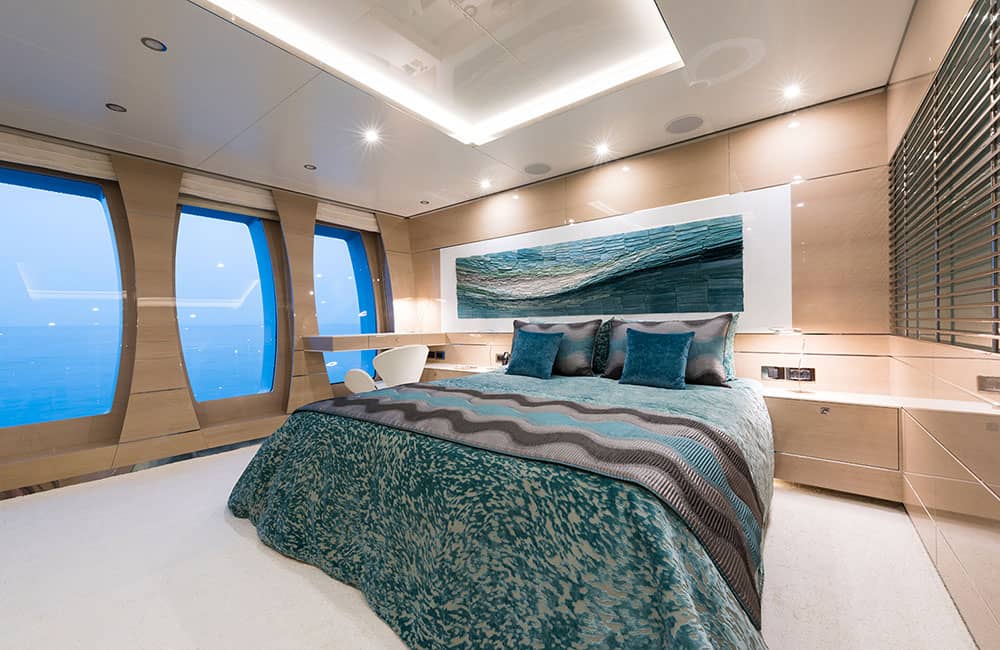 Luxurious guest bedroom with massive windows