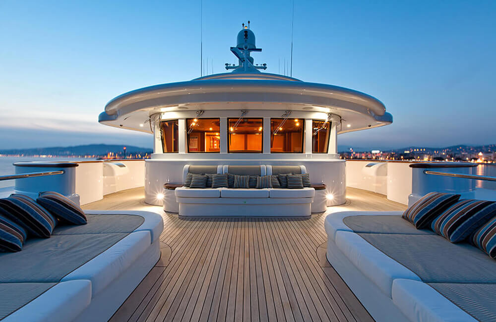 Sun deck at night on yacht Pride