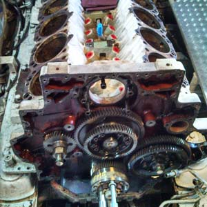 A large yacht main engine block being rebuilt