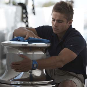 Bosun Deckhand polishing a capstan