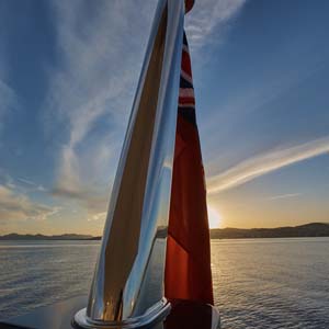 Red Duster Flag on a yacht at Sunrise
