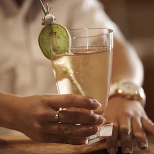 Stewardess serving a cocktail