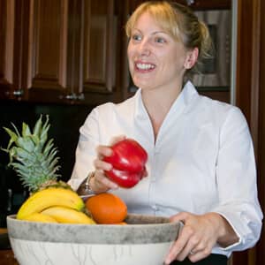 Yacht cook with bowl of fruit